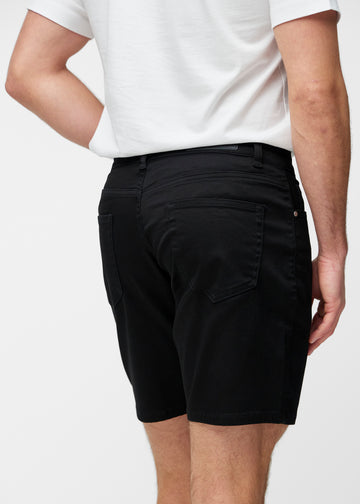 Black shorts for men in the colour Ravens seen from the back close up to show fit and details.