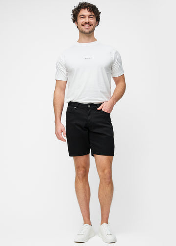 Full image of a model wearing black shorts for men in the colour Ravens with a regular fit.