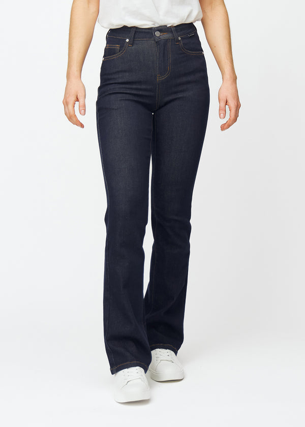 Deep dark blue denim jeans for women in the color Midnights with a bootcut fit that is fitted over the hips and thighs and has a slight flare at the ankles, seen from the front.