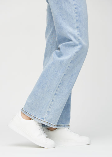 The ankles of a model, so you can see how loose the jeans fit.