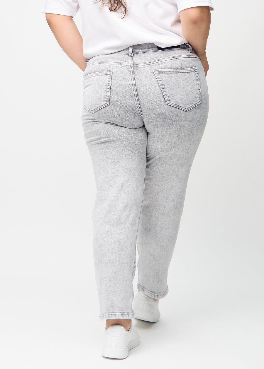 Regular jeans for women in light grey, color Ashes. Back view on a plus-size model, showing the full fit.