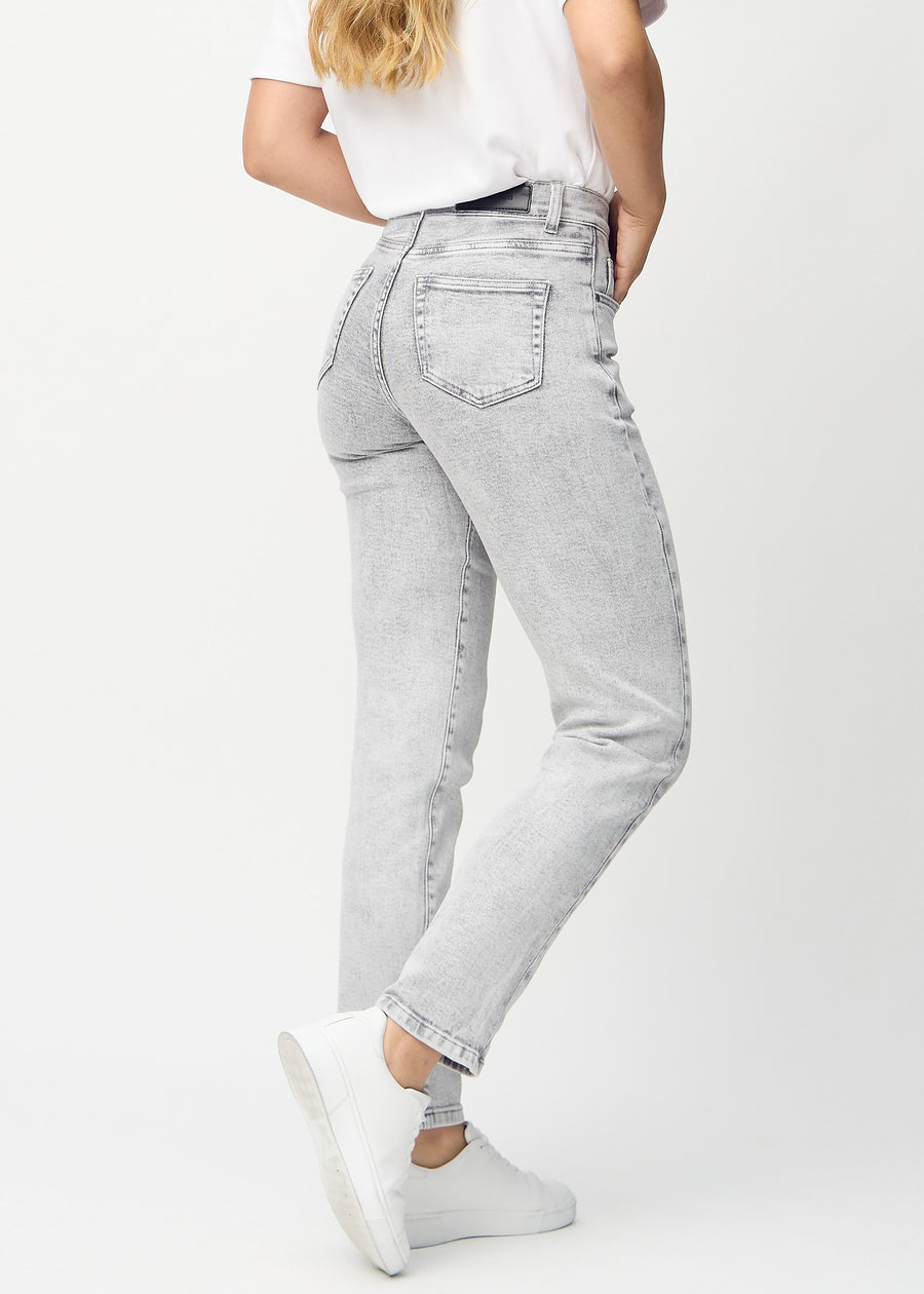 Regular jeans for women in light grey, color Ashes. Back view on a model, showing the full fit.