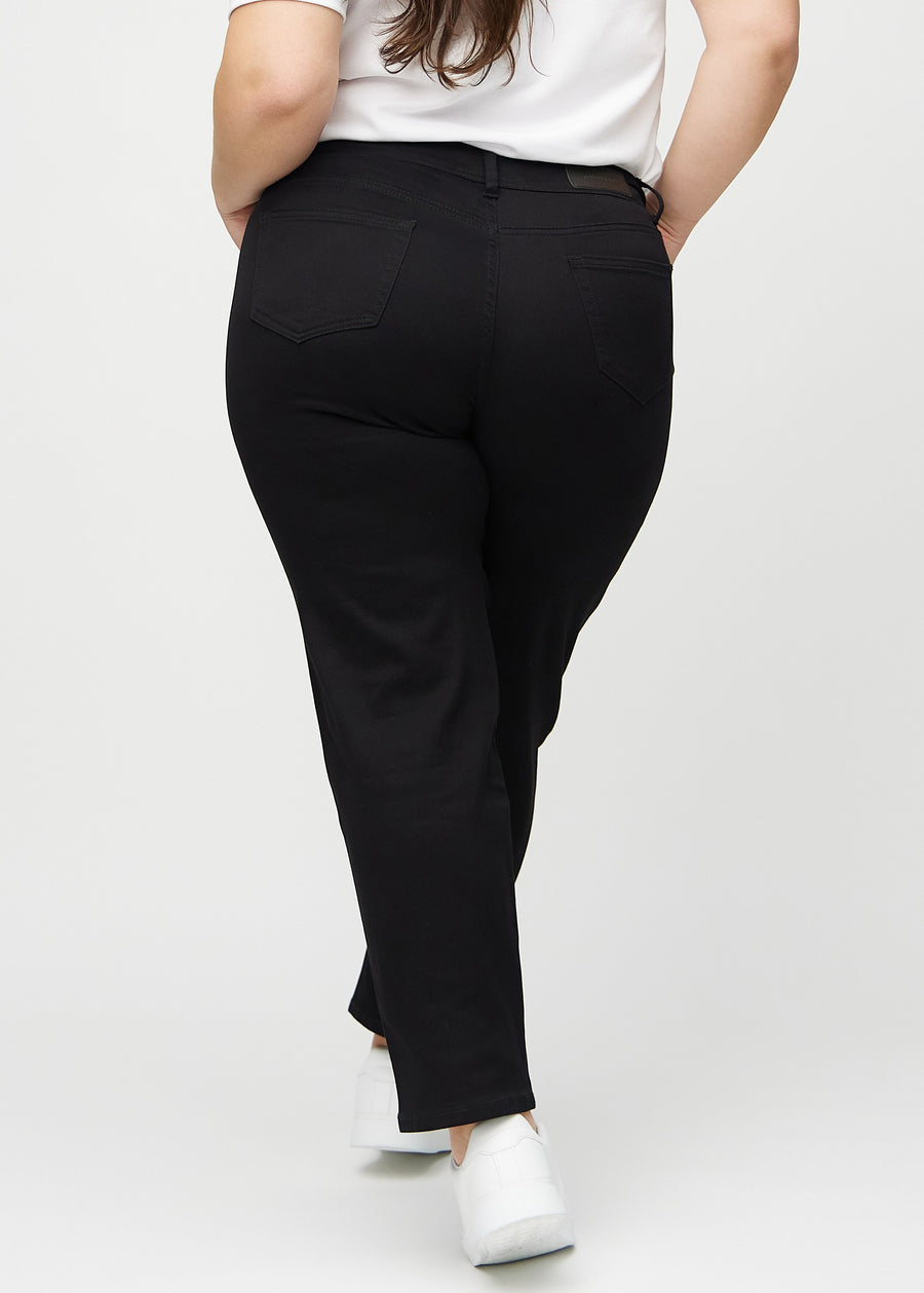 Black regular jeans seen from the back on a plus-size model, so the full product can be seen.