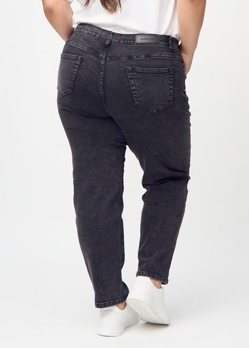 Regular jeans for women in dark grey, color Shadows. Back view on a plus-size model, showing the full fit.