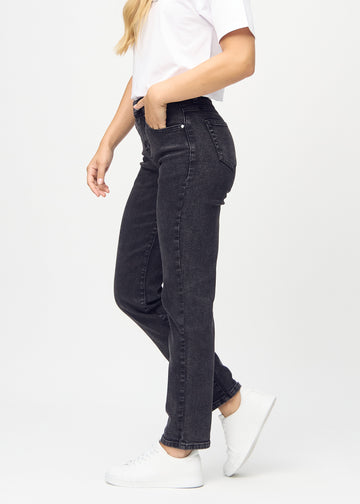 Regular jeans for women in dark grey, color Shadows. Side view on a model.