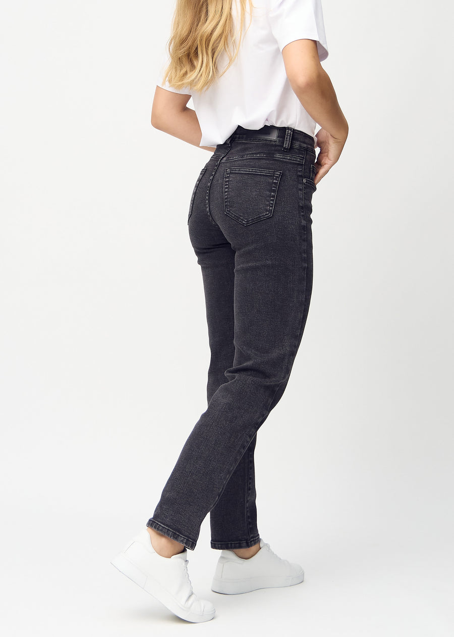 Regular jeans for women in dark grey, color Shadows. Back view on a model, showing the full fit.