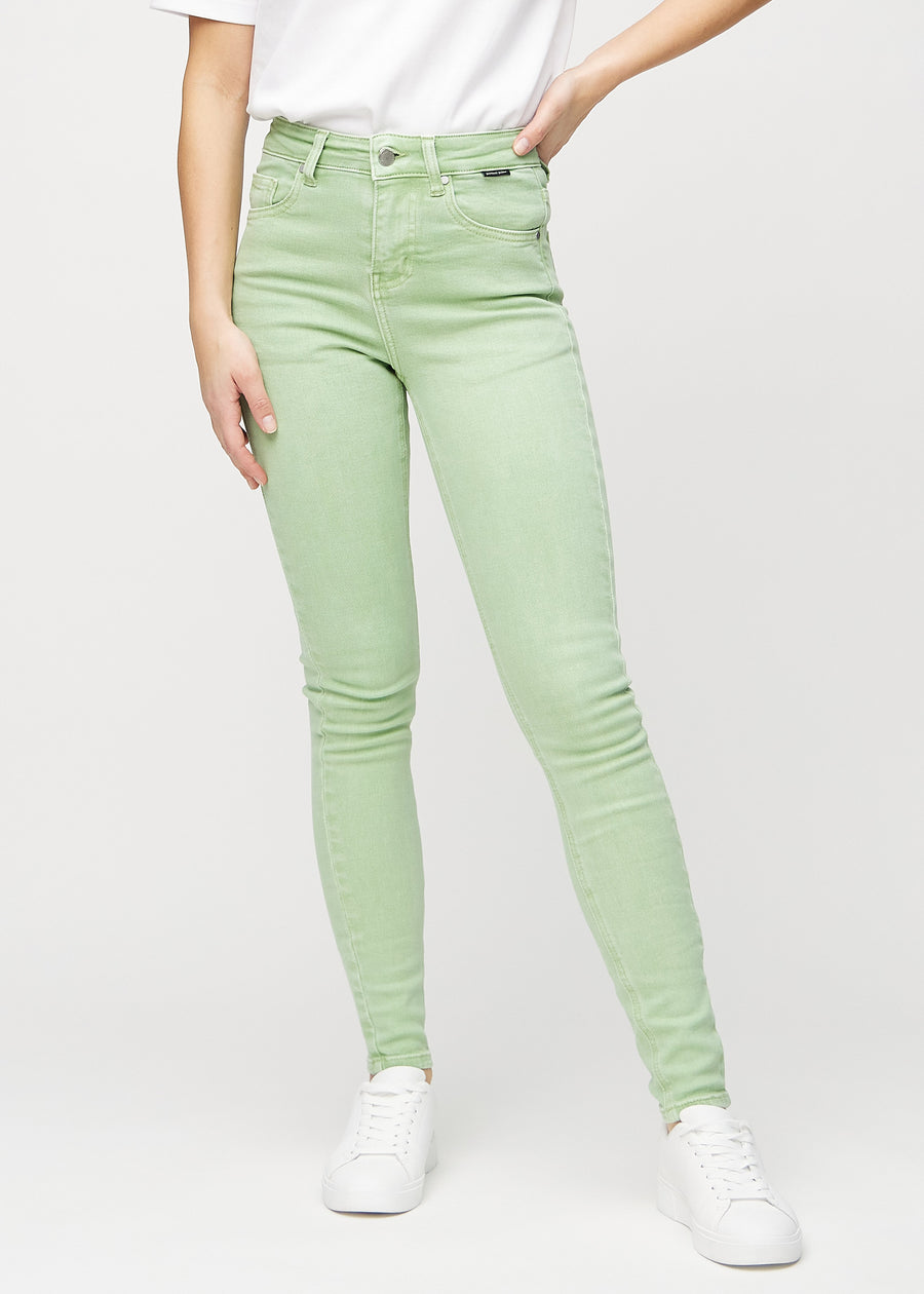 Skinny jeans for women in light green, color Mints. Front view on a model, showing the close fit through the legs.