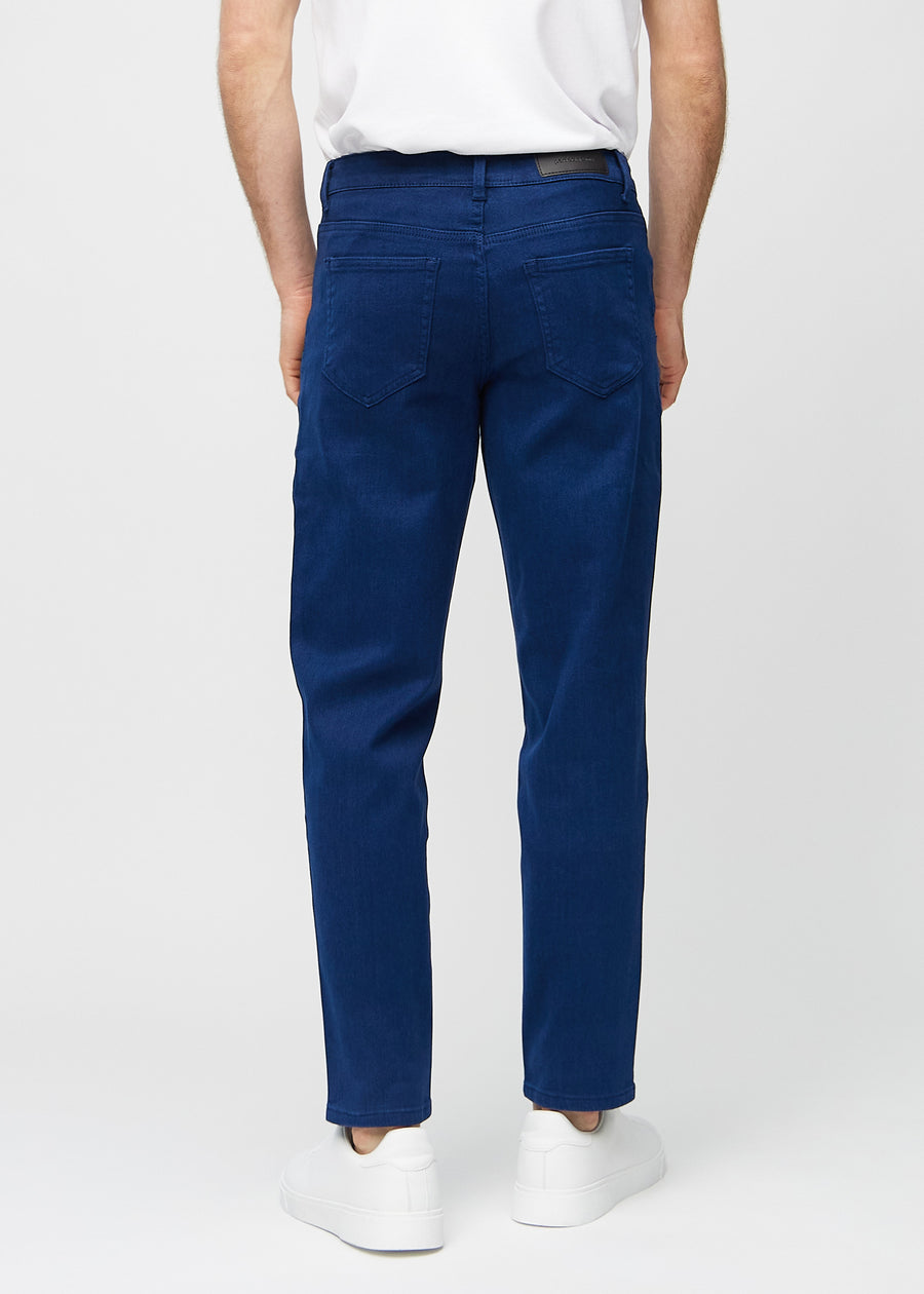 Dark blue regular jeans seen from the back, so the entire product can be seen.