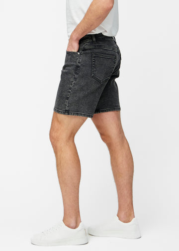 Dark grey denim shorts for men in the colour Shadows with a regular fit seen from the side on a model.