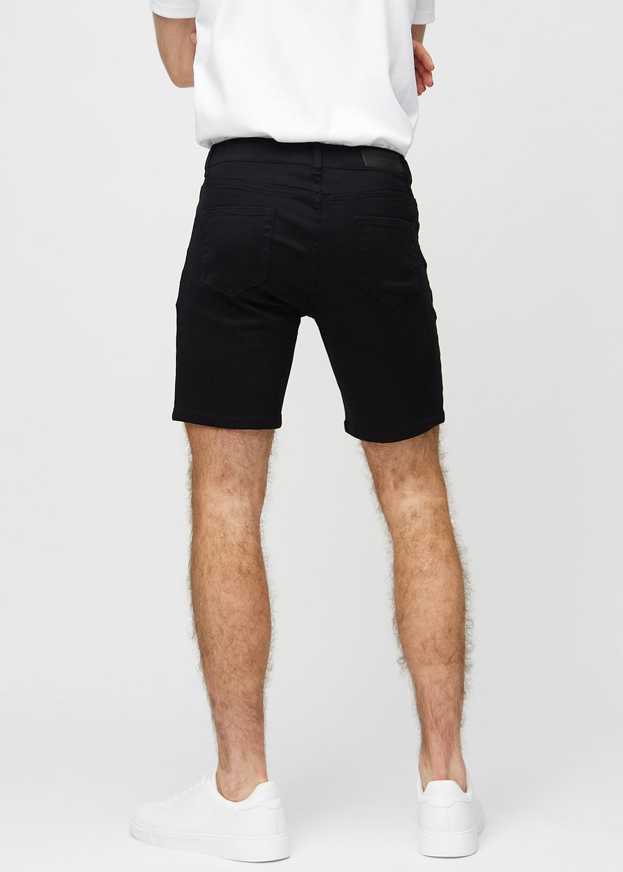 Black middle-slim shorts seen from the back, so the entire product can be seen.