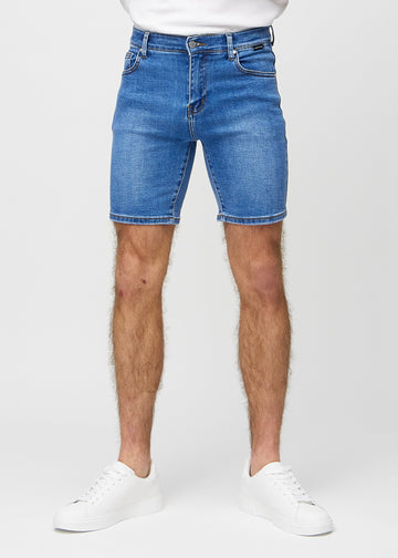 Denim middle-slim shorts, which fit straight along the thigh and end just above the knee, seen from the front.
