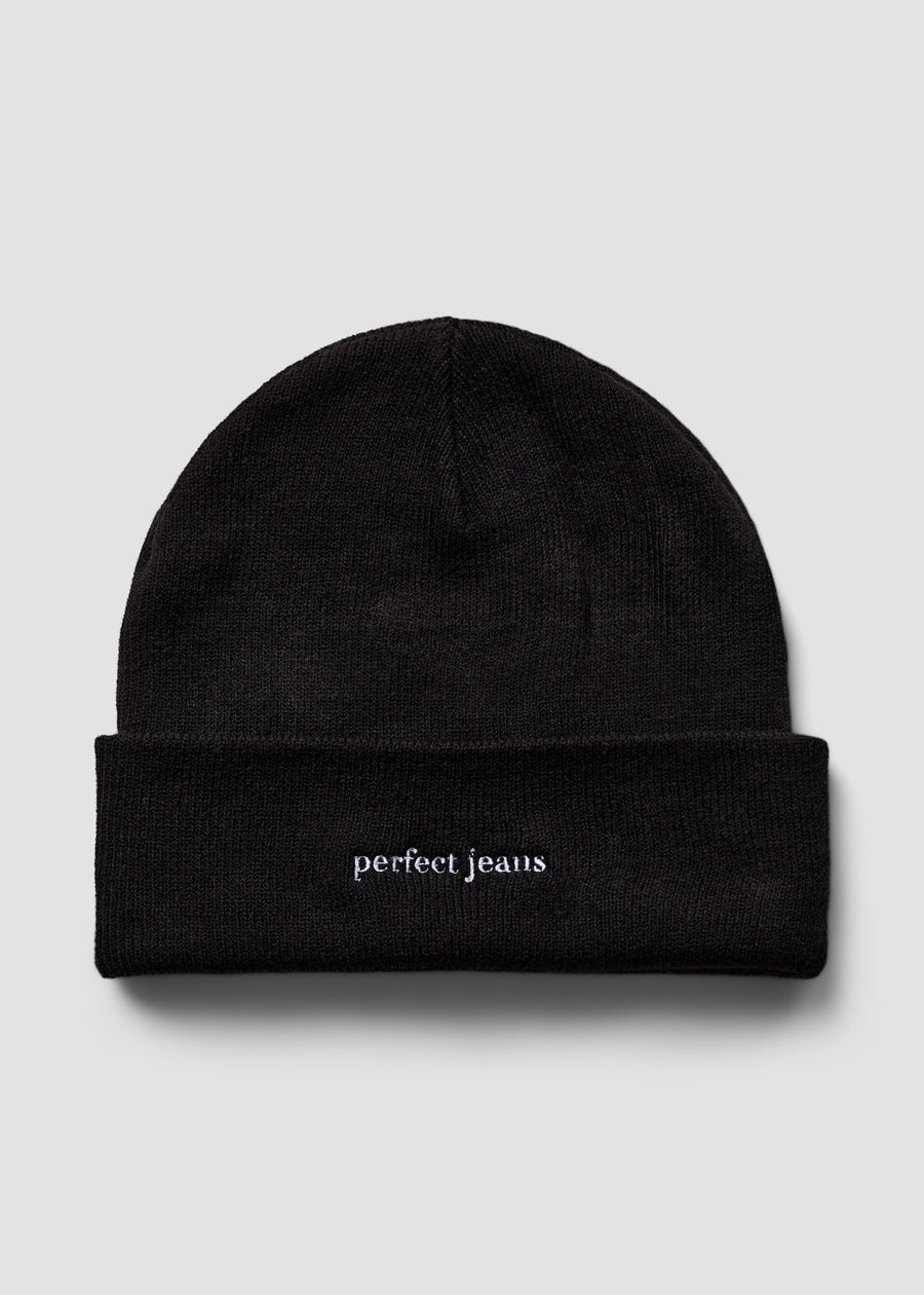 Black beanie by Perfect Jeans with a white logo on the front.